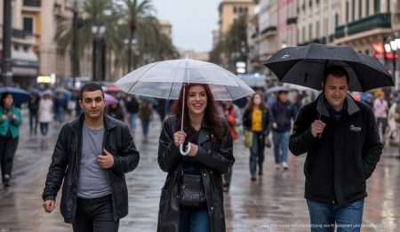 Mallorcas Wetter am 23. Dezember: Regen und milde Temperaturen Regenwetter auf Mallorca am 23. Dezember 2025 mit Menschen und Regenschirmen.