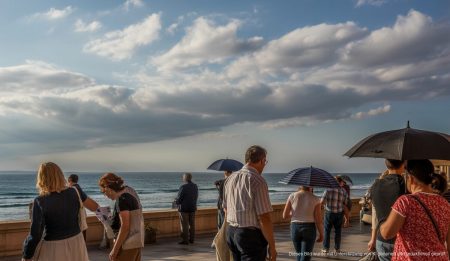 Mallorca Wetter: Frühlingstemperaturen mit Sonnenschein und Regen Menschen genießen Frühlingswetter mit Sonne und Regen auf Mallorca